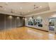 Clean yoga studio with natural wood floors, modern lighting, and serene views at 12410 Osorio Ct # 204, Sarasota, FL 34238