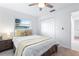 Comfortable bedroom with a bed, carpet, and built in closet at 128 Da Vinci Dr, Nokomis, FL 34275
