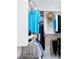 Organized walk-in closet with shelving and hanging rods, showcasing ample storage space at 128 Da Vinci Dr, Nokomis, FL 34275