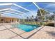 Beautiful in-ground screened pool with brick paver deck, ideal for enjoying outdoor living at 128 Da Vinci Dr, Nokomis, FL 34275