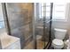 Modern bathroom featuring a glass-enclosed shower and updated fixtures, creating a clean and functional space at 1305 20Th W St, Bradenton, FL 34205