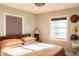 Comfortable bedroom with warm lighting, neutral color palette, and simple decor, offering a relaxing atmosphere at 1305 20Th W St, Bradenton, FL 34205