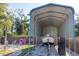 Covered boat storage providing ample space and protection, surrounded by a fenced yard at 1305 20Th W St, Bradenton, FL 34205