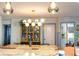 Stylish kitchen with stainless steel appliances, pendant lighting, and breakfast bar overlooking dining at 1305 20Th W St, Bradenton, FL 34205