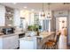 Contemporary kitchen featuring stainless steel appliances, a breakfast bar, and stylish pendant lighting at 1305 20Th W St, Bradenton, FL 34205