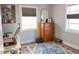 Well-lit office featuring a desk, rolling chair, and colorful rug at 1305 20Th W St, Bradenton, FL 34205