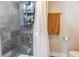 Shower featuring modern tile, shower caddy, and neutral-colored accessories, offering a spa-like feel at 1305 20Th W St, Bradenton, FL 34205