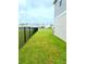 Green backyard with fence at 13068 Oak Hill Way, Parrish, FL 34219