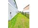 Sideyard with view of black metal fence at 13068 Oak Hill Way, Parrish, FL 34219