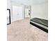 Spacious bedroom with a double door closet, neutral carpet, and a full-length mirror at 13068 Oak Hill Way, Parrish, FL 34219