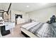 Bright bedroom features a comfortable bed, neutral colors and functional furnishings for a relaxing retreat at 13068 Oak Hill Way, Parrish, FL 34219