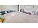 Spacious bonus room with neutral carpet, lots of open floor space and natural light at 13068 Oak Hill Way, Parrish, FL 34219