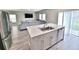 Bright modern kitchen with stainless steel appliances, stylish cabinets and countertops at 13068 Oak Hill Way, Parrish, FL 34219