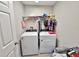 Functional laundry area with modern washer and dryer at 13068 Oak Hill Way, Parrish, FL 34219