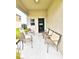 Spacious outdoor porch featuring comfortable seating for relaxing and entertaining guests at 13068 Oak Hill Way, Parrish, FL 34219