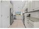 Modern kitchen with stainless steel appliances and granite countertops at 13711 Messina Loop # 101, Bradenton, FL 34211