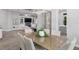 Stylish dining area flows into a comfortable living space, perfect for entertaining at 14817 Secret Harbor Pl, Lakewood Ranch, FL 34202