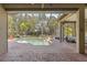 Enjoy the pool and screened lanai offering space for lounging and entertaining at 14817 Secret Harbor Pl, Lakewood Ranch, FL 34202