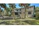 The exterior of the property showing the deck and balcony at 1533 Oak Way, Sarasota, FL 34232