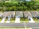 Wide aerial view of the home and neighborhood with golf course nearby at 17108 Harvest Moon Way, Bradenton, FL 34211