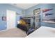 Vibrant bedroom featuring bunk beds, playful sports decor, and ample natural light at 17108 Harvest Moon Way, Bradenton, FL 34211