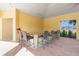 Outdoor bar area with granite counter, sink, seating for six, and a beautiful view at 17108 Harvest Moon Way, Bradenton, FL 34211
