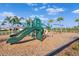 Community playground features slides, swings, and climbing structures in a safe, mulched environment at 17108 Harvest Moon Way, Bradenton, FL 34211