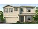 Charming two-story home featuring a two-car garage, neutral tones, and lush landscaping at 17218 Whiskey Creek Trl, Parrish, FL 34219