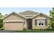 Charming single-story home with neutral stucco, a two-car garage, and inviting front landscape and window shutters at 17226 Whiskey Creek Trl, Parrish, FL 34219
