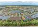Aerial view of a Primary-planned community with lakes and beautiful homes at 17696 Northwood Pl, Lakewood Ranch, FL 34202