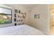 A bedroom decorated with fun shelves and a comfortable place to rest at 17696 Northwood Pl, Lakewood Ranch, FL 34202