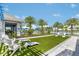 Outdoor recreation area, with a lawn, and backyard games by the pool at 17924 Palmiste Dr, Bradenton, FL 34202