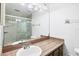 Bathroom with a tile countertop and a shower at 18348 Yale Ave, Port Charlotte, FL 33948