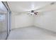 Bright bedroom featuring a ceiling fan and a closet at 18348 Yale Ave, Port Charlotte, FL 33948