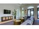 A stylish clubhouse lounge area offers comfortable seating, modern decor, and sleek design for relaxation and socializing at 2309 Blue Mahoe Ln, Sarasota, FL 34240