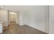 Bright living room boasts stylish wood-look tile flooring and neutral paint palette at 2309 Blue Mahoe Ln, Sarasota, FL 34240