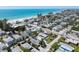 Overview of neighborhood blocks from white sandy beach and the ocean at 2714 Avenue C, Holmes Beach, FL 34217