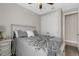 Neutral toned main bedroom featuring a ceiling fan, closet, and comfortable bed at 3110 Tolmino Ct, Bradenton, FL 34211