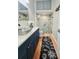 Bathroom featuring modern vanity with basin sink and a glass enclosed shower with built-in bench at 321 Reclinata Cir, Venice, FL 34292