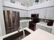 Well-equipped kitchen with stainless steel appliances, light gray cabinets, and modern fixtures at 321 Reclinata Cir, Venice, FL 34292