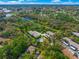 Beautiful aerial view of a community featuring lush greenery, waterways and a community pool at 3365 Cross Creek Dr # 3365, Sarasota, FL 34231