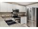 Well-equipped kitchen featuring stainless steel appliances and granite countertops at 3702 54Th W Dr # 103, Bradenton, FL 34210