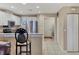 Updated kitchen with white cabinetry and breakfast bar at 3702 54Th W Dr # 103, Bradenton, FL 34210