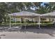Assigned parking spot with awning in front of condo building at 3702 54Th W Dr # 103, Bradenton, FL 34210