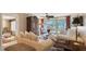 Inviting living room with balcony access, showcasing views and comfortable seating arrangements at 5055 Gulf Of Mexico Dr # 331, Longboat Key, FL 34228