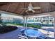 Inviting gazebo seating area overlooking the tennis courts, offering a comfortable space to relax and socialize at 5055 Gulf Of Mexico Dr # 331, Longboat Key, FL 34228