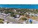 Aerial view of a building with ample parking, close to the waterfront and adjacent to a cemetery at 51 Webb St, Osprey, FL 34229