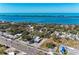 Beautiful aerial view of waterfront community with picturesque coastlines and homes surrounded by lush greenery at 51 Webb St, Osprey, FL 34229