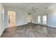 Open bedroom with french door, and access to kitchen and bathroom at 51 Webb St, Osprey, FL 34229
