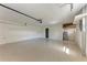 This garage features an epoxy floor, an insulated door, and plenty of room for vehicles at 51 Webb St, Osprey, FL 34229